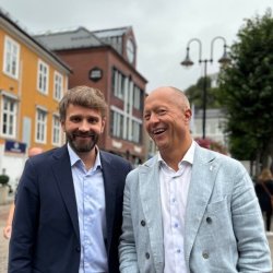 Portrettbilde av helseminister Jan Christian Vestre og administrerende direktør Johan Ronæs