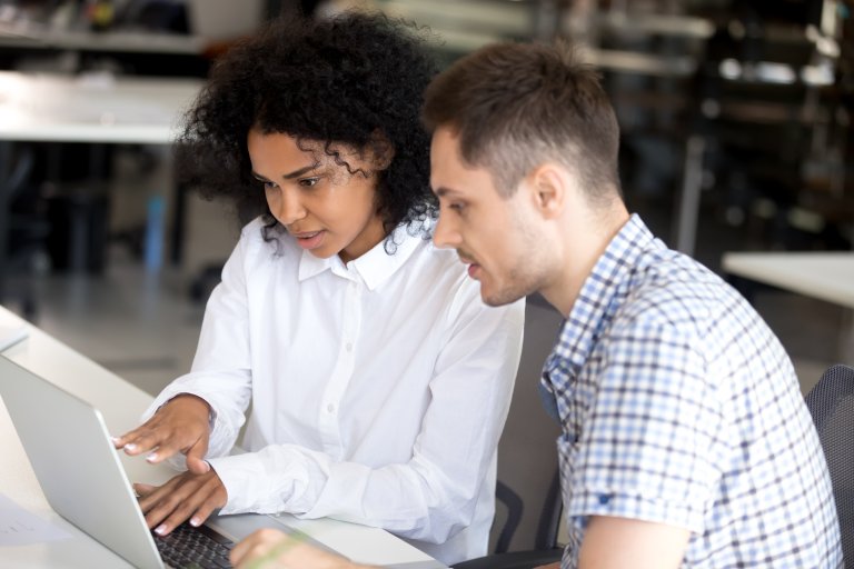 30379189-diverse-students-studying-together-looking-at-computer.jpg